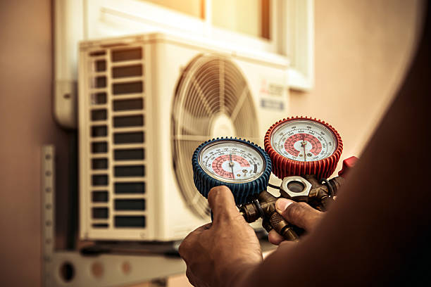 Professional Hvac technician working in Milburn, OK